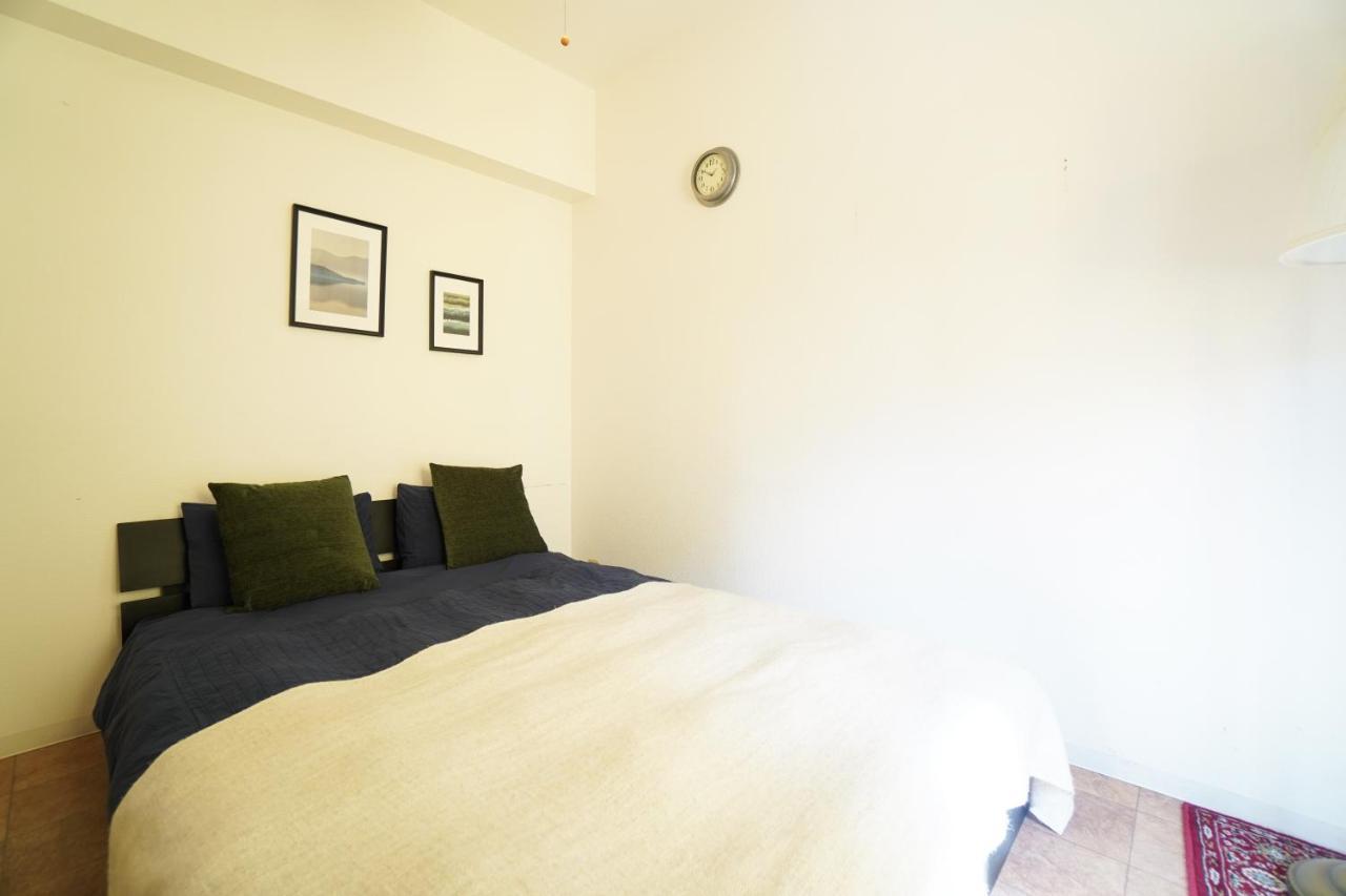 Tsurigane Building Apartment Osaka Bagian luar foto