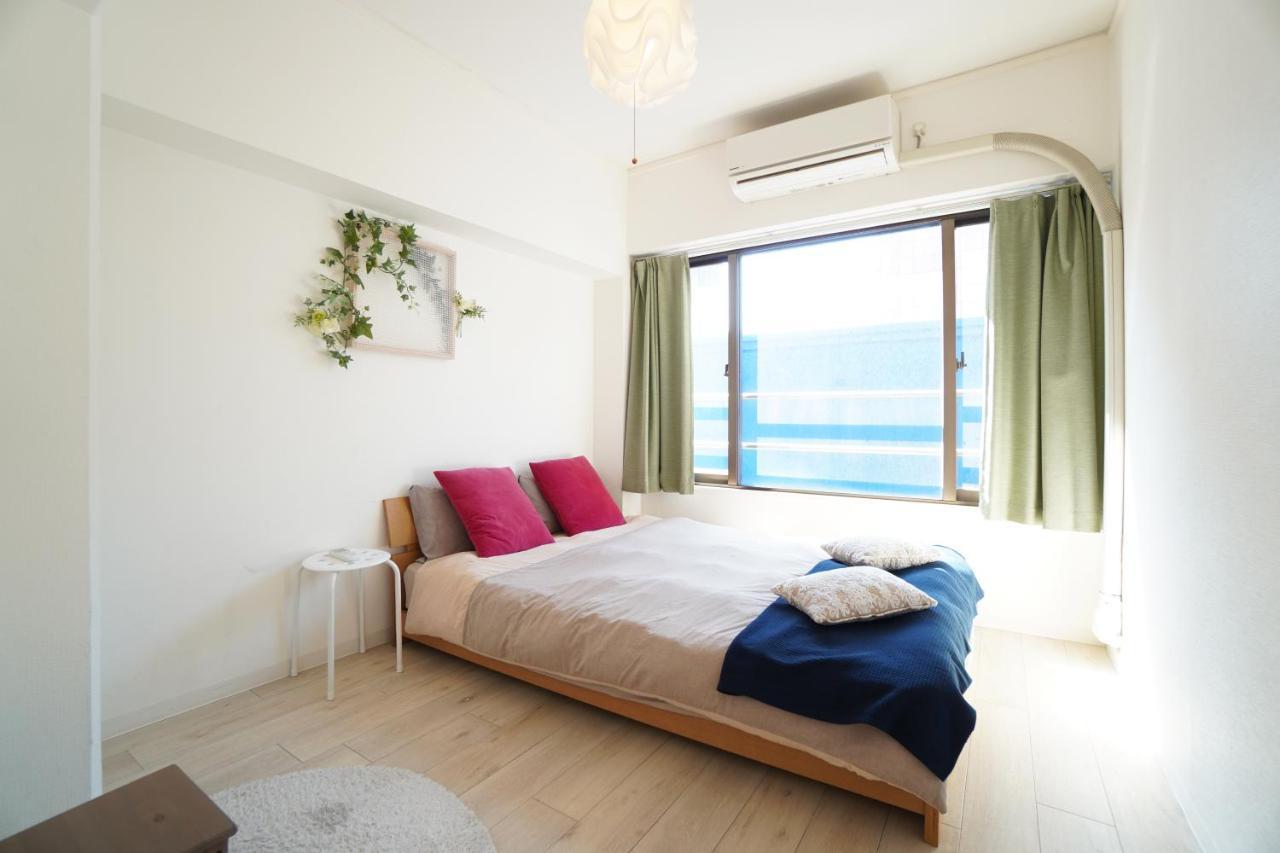 Tsurigane Building Apartment Osaka Bagian luar foto